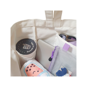 The wee bean eco-friendly canvas tote with pocket for water bottle features 