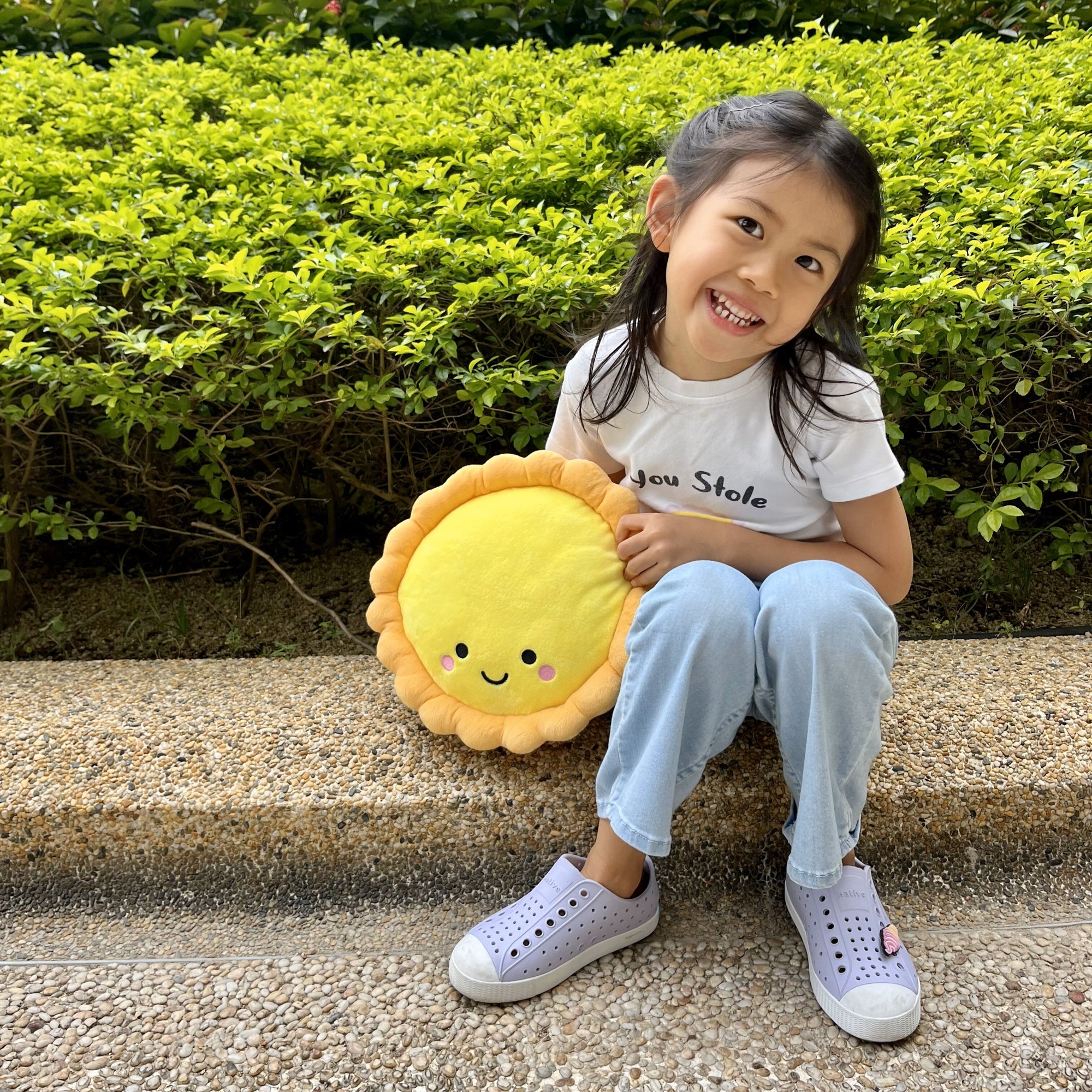 the wee bean plushie pillow snuggle buddy in egg tart top angle view