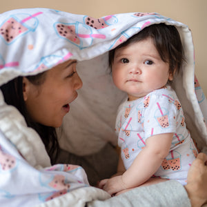 mommy and me playing peekaboo in organic cotton baby onesie romper bodysuit in boba bubble tea