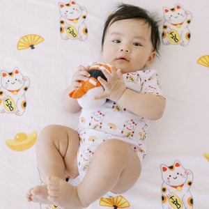 cute baby on the wee bean milestone blanket in japan lucky cat