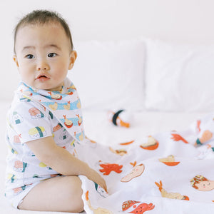 the wee bean organic cotton baby onesie in sushi and bib in tempura